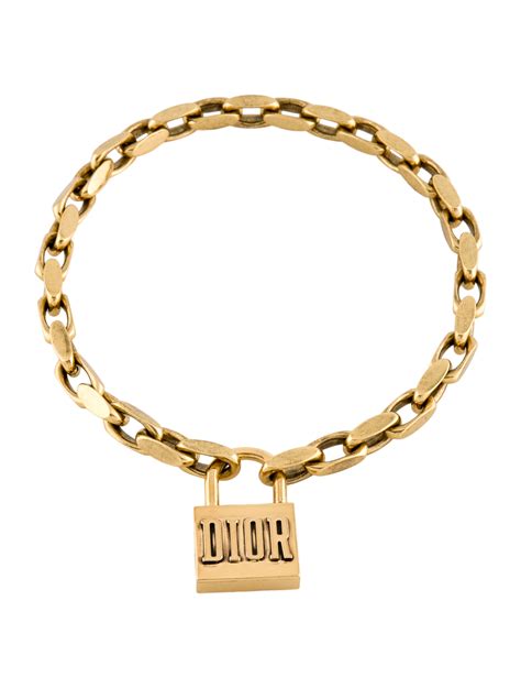 dior lucky locket necklace in aged gold tone metal|DIOR.